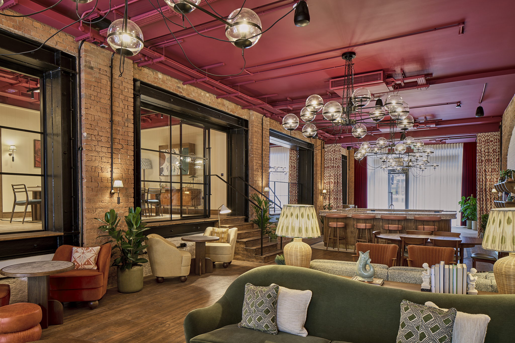 The Waterman teapoint and lounge with cherry red ceilings and eccentric furnishing